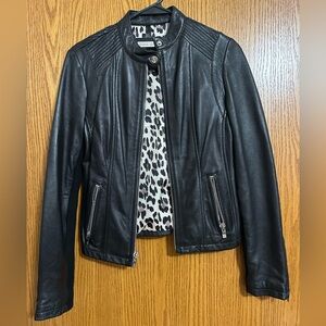 Wilson’s Leather (Black Rivet) women’s leather jacket w/ sweater knit accent.